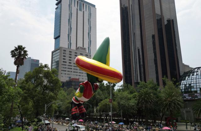 A giant balloon shaped like "Pique," the mascot of the 1986 Mexico World Cup, is seen during the 2026 World Cup parade in Mexico City on June 13, 2026. (Photo by Alfredo ESTRELLA / AFP)