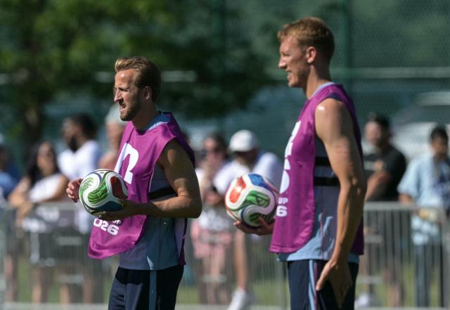 England's forward #09 Harry Kane (L) and defender #15 Dan Burn attend a training session ahead of England's 2026 World Cup football tournament Group L football match against Croatia at Swope Soccer Village in Kansas City on June 13, 2026.  (Photo by JUAN MABROMATA / AFP)