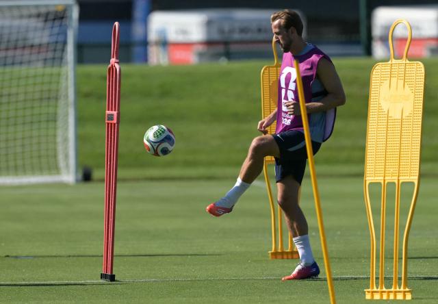 England's forward #09 Harry Kane plays with a ball during a training session ahead of England's 2026 World Cup football tournament Group L football match against Croatia at Swope Soccer Village in Kansas City on June 13, 2026.  (Photo by JUAN MABROMATA / AFP)