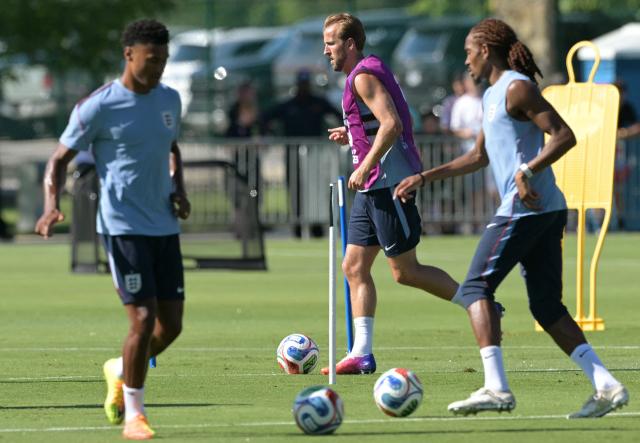 England's forward #09 Harry Kane plays with a ball during a training session ahead of England's 2026 World Cup football tournament Group L football match against Croatia at Swope Soccer Village in Kansas City on June 13, 2026.  (Photo by JUAN MABROMATA / AFP)