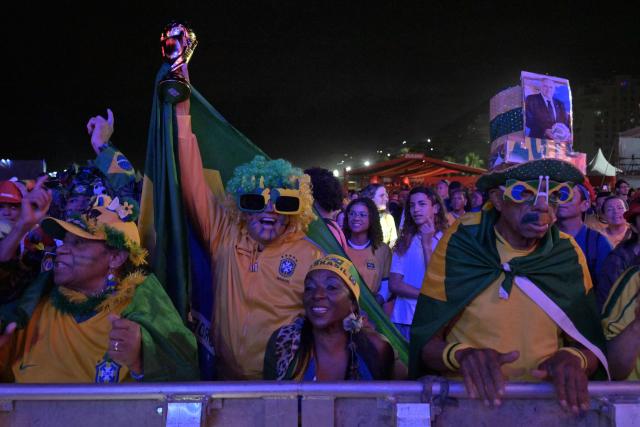 EDITORS NOTE: Graphic content / Brazilian fans watch the live broadcast of the 2026 World Cup football match between Brazil and Morocco at the Copacabana Arena in Rio de Janeiro, Brazil, on June 13 2026. (Photo by NELSON ALMEIDA / AFP)