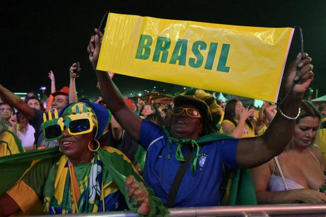Brazilian fans watch the live broadcast of the 2026 World Cup football match between Brazil and Morocco at the Copacabana Arena in Rio de Janeiro, Brazil, on June 13 2026. (Photo by NELSON ALMEIDA / AFP)