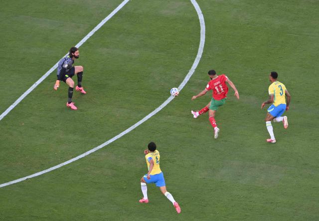 Morocco's midfielder #11 Ismael Saibari scores his team's first goal during the 2026 World Cup Group C football match between Brazil and Morocco at the New York/New Jersey Stadium in East Rutherford on June 13, 2026. (Photo by Angela WEISS / AFP)