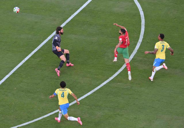 TOPSHOT - Morocco's midfielder #11 Ismael Saibari (C) scores his team's first goal during the 2026 World Cup Group C football match between Brazil and Morocco at the New York/New Jersey Stadium in East Rutherford on June 13, 2026. (Photo by Angela WEISS / AFP)