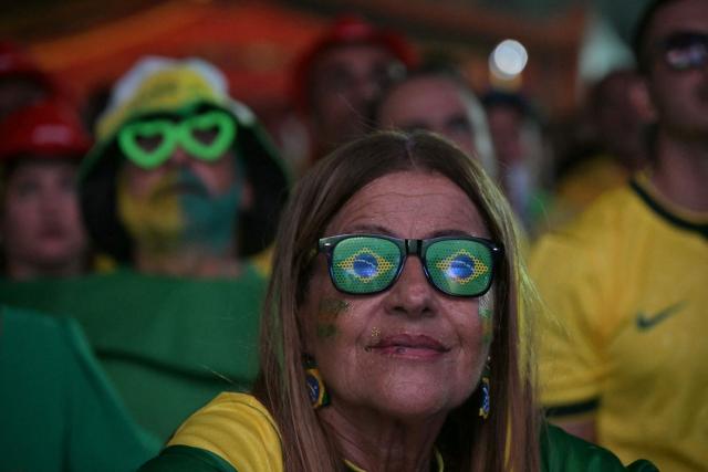 Brazilian fans watch the live broadcast of the 2026 World Cup football match between Brazil and Morocco at the Copacabana Arena in Rio de Janeiro, Brazil, on June 13 2026. (Photo by NELSON ALMEIDA / AFP)