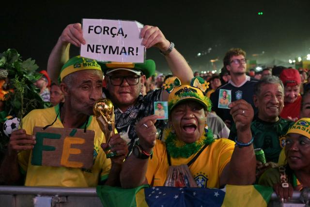 Brazilian fans watch the live broadcast of the 2026 World Cup football match between Brazil and Morocco with a sign readinmg "Strength, Neymar" at the Copacabana Arena in Rio de Janeiro, Brazil, on June 13 2026. (Photo by NELSON ALMEIDA / AFP)