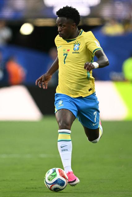 Brazil's forward #07 Vinicius Junior runs with the ball during the 2026 World Cup Group C football match between Brazil and Morocco at the New York/New Jersey Stadium in East Rutherford on June 13, 2026. (Photo by MAURO PIMENTEL / AFP)
