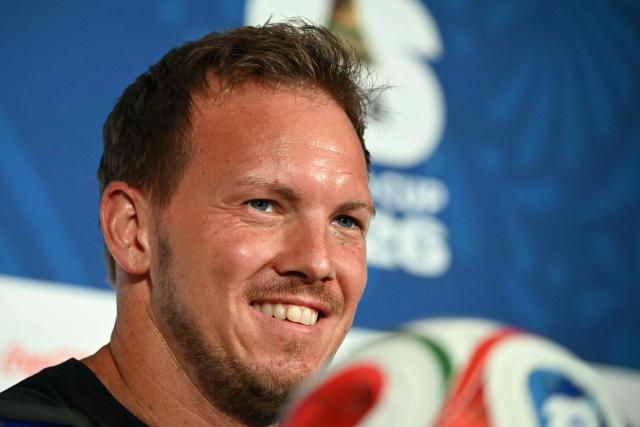 Germany's head coach Julian Nagelsmann smiles during a press conference at the Houston Stadium in Houston on June 13, 2026, on the eve of the 2026 World Cup football match between Germany and Curacao.  (Photo by RONALDO SCHEMIDT / AFP)