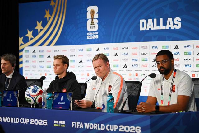 Netherlands' midfielder #21 Frenkie de Jong and Netherlands' head coach Ronald Koeman attend a press conference ahead of Netherlands' 2026 World Cup football tournament Group F football match against Japan in Dallas on June 13, 2026.  (Photo by Paul ELLIS / AFP)
