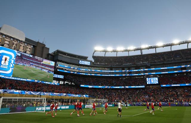 Scotland players warm up ahead of the 2026 World Cup Group C football match between Haiti and Scotland at the Boston Stadium in Foxborough on June 13, 2026. (Photo by FRANCK FIFE / AFP)
