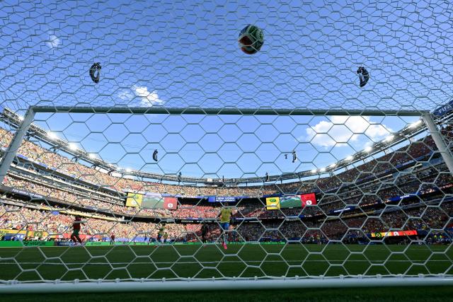 Brazil’s defender #04 Marquinhos reacts after Morocco’s midfielder #11 Ismael Saibari (out of frame) scores his team’s first goal during the 2026 World Cup Group C football match between Brazil and Morocco at the New York/New Jersey Stadium in East Rutherford on June 13, 2026. (Photo by MAURO PIMENTEL / AFP)