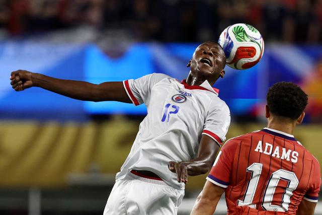 Haiti's midfielder #17 Danley Jean Jacques and Scotland's forward #10 Che Adams fight for the ball during the 2026 World Cup Group C football match between Haiti and Scotland at the Boston Stadium in Foxborough on June 13, 2026. (Photo by FRANCK FIFE / AFP)