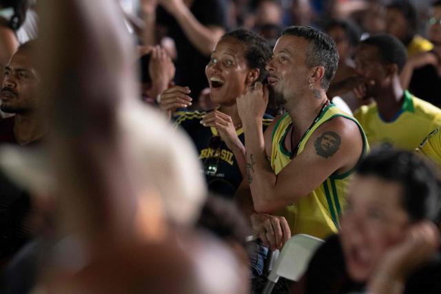 Brazilian national football team fans watch the FIFA World Cup match between Brazil and Morocco at the Estudio 50, in the Vedado neighborhood, Havana, on June 13, 2026. (Photo by Pablo PORCIUNCULA / AFP)