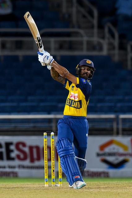 Kamil Mishara of Sri Lanka hits 6 during the second Twenty20 (T20) international cricket match between West Indies and Sri Lanka at Sabina Park in Kingston, Jamaica, on June 13, 2026. (Photo by Randy Brooks / AFP)