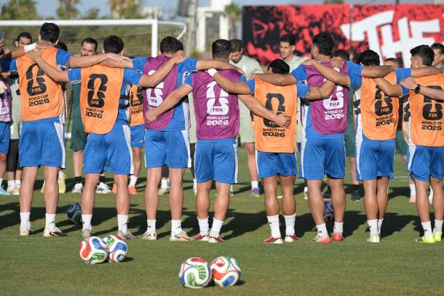 Iran's players gather in circle during a training session for the 2026 World Cup football tournament Group G football match against New Zealand in Tijuana, Mexico on June 13, 2026.  (Photo by Guillermo Arias / AFP)