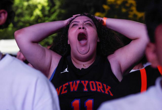 Knicks fans inside Wollman Rink in Central Park react to Game 5 of the NBA finals between the New York Knicks and San Antonio Spurs, in New York, on June 13, 2026. (Photo by kena betancur / AFP)