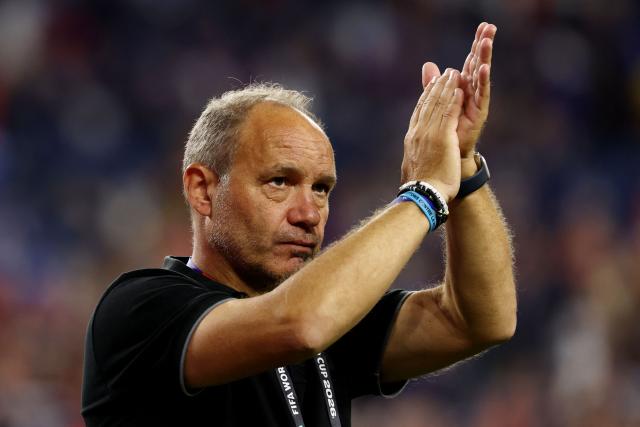Haiti's French head coach Sebastien Migne acknowledges the crowd after losing the 2026 World Cup Group C football match between Haiti and Scotland at the Boston Stadium in Foxborough on June 13, 2026. (Photo by FRANCK FIFE / AFP)