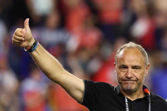 Haiti's French head coach Sebastien Migne acknowledges the crowd after losing the 2026 World Cup Group C football match between Haiti and Scotland at the Boston Stadium in Foxborough on June 13, 2026. (Photo by FRANCK FIFE / AFP)