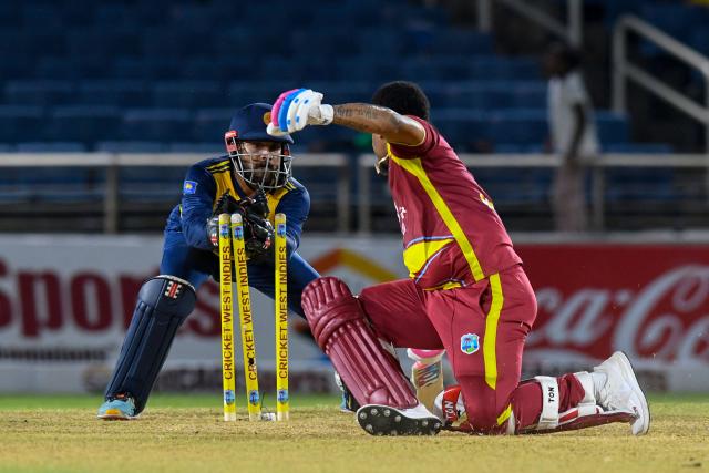 Kusal Mendis (L) of Sri Lanka attempts to stump Shimron Hetmyer (R) of West Indies during the second Twenty20 (T20) international cricket match between West Indies and Sri Lanka at Sabina Park in Kingston, Jamaica, on June 13, 2026. (Photo by Randy Brooks / AFP)