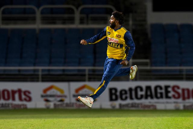Dunith Wellalage of Sri Lanka celebrates the dismissal of Romario Shepherd of West Indies during the second Twenty20 (T20) international cricket match between West Indies and Sri Lanka at Sabina Park in Kingston, Jamaica, on June 13, 2026. (Photo by Randy Brooks / AFP)
