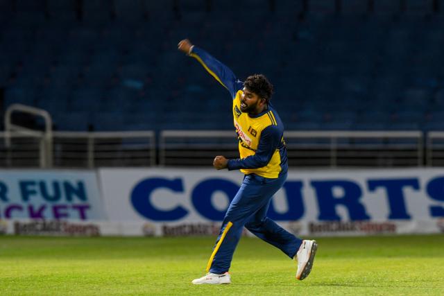 Dunith Wellalage of Sri Lanka celebrates the dismissal of Romario Shepherd of West Indies during the second Twenty20 (T20) international cricket match between West Indies and Sri Lanka at Sabina Park in Kingston, Jamaica, on June 13, 2026. (Photo by Randy Brooks / AFP)