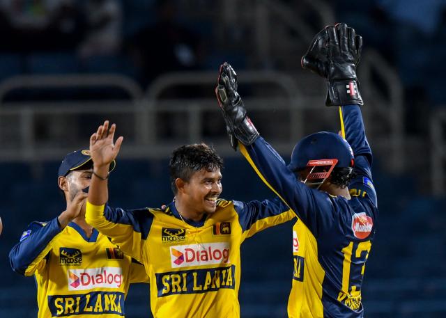 Dushmantha Chameera (C) of Sri Lanka celebrates the dismissal of Matthew Forde of West Indies during the second Twenty20 (T20) international cricket match between West Indies and Sri Lanka at Sabina Park in Kingston, Jamaica, on June 13, 2026. (Photo by Randy Brooks / AFP)