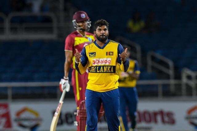 Wanindu Hasaranga of Sri Lanka celebrates the dismissal of Akeal Hosein of West Indies during the second Twenty20 (T20) international cricket match between West Indies and Sri Lanka at Sabina Park in Kingston, Jamaica, on June 13, 2026. (Photo by Randy Brooks / AFP)