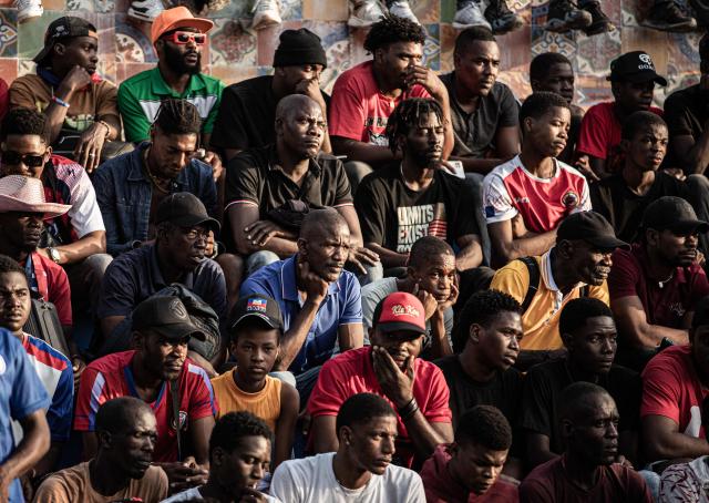 Haiti fans watch the 2026 FIFA World Cup match between Haiti and Scotland, in Petion-ville, Port-au-Prince, Haiti, on June 13, 2026. (Photo by Clarens SIFFROY / AFP)