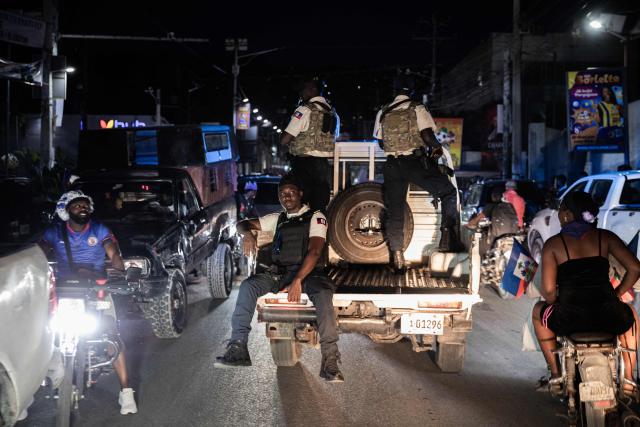 Police patrol the streets during the 2026 FIFA World Cup match between Haiti and Scotland, in Port-Au-Prince, on June 13, 2026. (Photo by Clarens SIFFROY / AFP)
