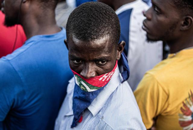 Haiti fans watch the 2026 FIFA World Cup match between Haiti and Scotland, in Petion-ville, Port-au-Prince, Haiti, on June 13, 2026. (Photo by Clarens SIFFROY / AFP)