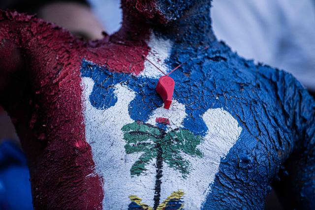 Haiti fans watch the 2026 FIFA World Cup match between Haiti and Scotland, in Petion-ville, Port-au-Prince, Haiti, on June 13, 2026. (Photo by Clarens SIFFROY / AFP)