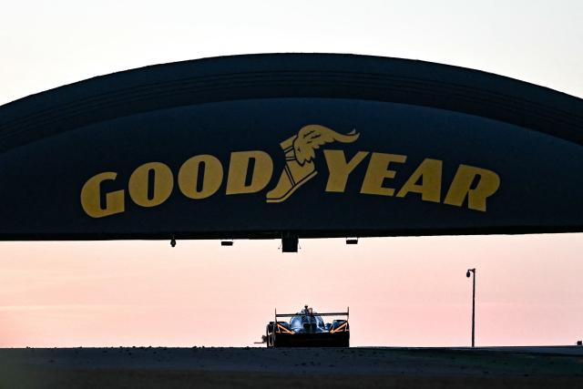 A car competes during the 94th edition of the 24 Hours of Le Mans, the motor endurance race, in Le Mans, western France, on June 14, 2026. (Photo by Lou BENOIST / AFP)