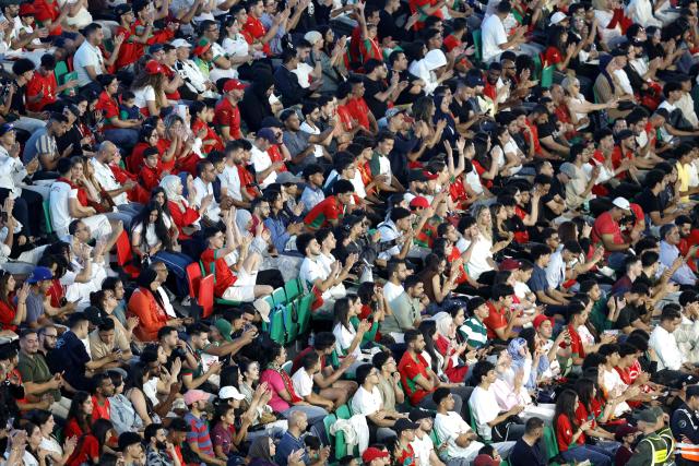 Fans gather to watch the 2026 World Cup football tournament match between Brazil and Morocco on a giant screen at Moulay el-Hassan Stadium, in the capital Rabat on June 14, 2026. Morocco and Brazil drew 1-1 in their Group C opening game at the MetLife Stadium. (Photo by Abdel Majid BZIOUAT / AFP)