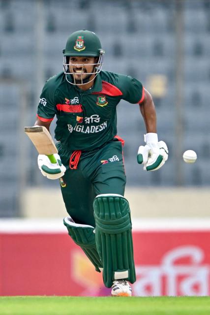 Bangladesh's captain Najmul Hossain Shanto reacts after playing a shot during the third one-day international (ODI) cricket match between Bangladesh and Australia at the Sher-e-Bangla National Stadium in Dhaka on June 14, 2026. (Photo by Munir UZ ZAMAN / AFP)