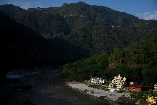 Tourists raft down the river Ganges in Rishikesh on June 13, 2026. (Photo by MANAN VATSYAYANA / AFP)