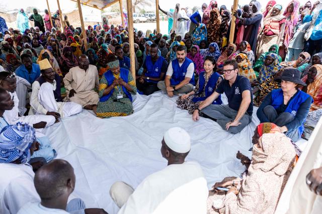 An International Organization for Migration (IOM) delegation meets with Chadian returnees in Tongori on June 9, 2026. Rising numbers of Chadians fleeing the Sudan war are arriving at the Adre border post in Chad, but funding shortages could force UN agencies on the ground to stop operating.
The civil conflict in Sudan has already cost tends of thousands of lives and forced more than 12 million people to flee their homes, more a million of them Chadian, according to UN figures. (Photo by Joris Bolomey / AFP)