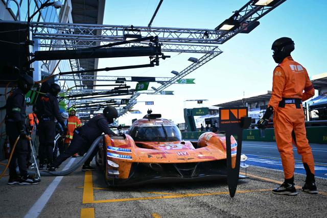 The Korean Genesis GMR-001-Hypercar #19 of GENESIS MAGMA RACING (LMDh) makes a pit stop during the 94th edition of the 24 Hours of Le Mans at the Le Mans circuit, north-western France, on June 14, 2026. (Photo by Lou BENOIST / AFP)