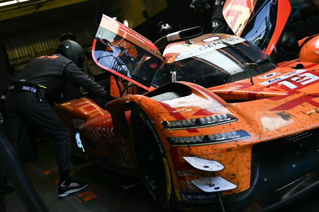 The Korean Genesis GMR-001-Hypercar #19 of GENESIS MAGMA RACING (LMDh) makes a pit stop during the 94th edition of the 24 Hours of Le Mans at the Le Mans circuit, north-western France, on June 14, 2026. (Photo by Lou BENOIST / AFP)