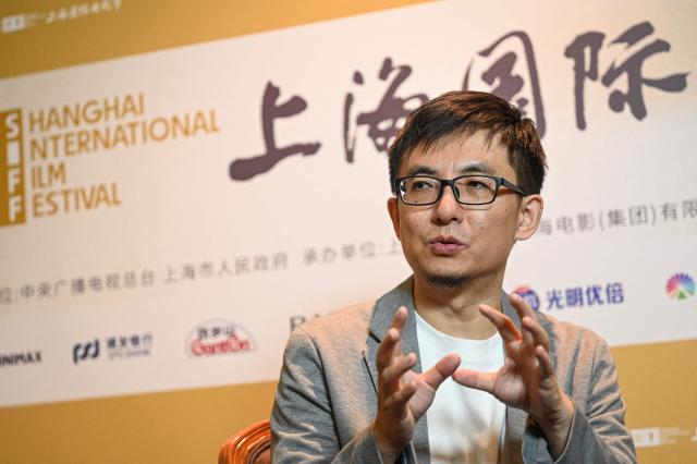 Chinese animator and director Yu Shui speaks in an interview with AFP during the 28th Shanghai International Film Festival in Shanghai on June 14, 2026. (Photo by Jade GAO / AFP)
