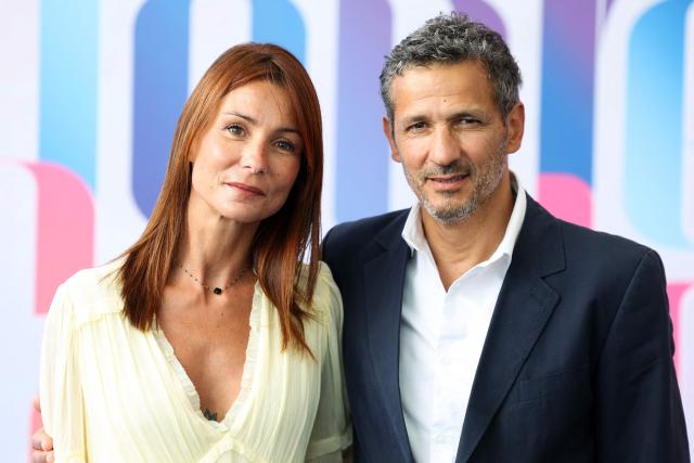 French actress Jennifer Lauret (L) and French-Algerian actor Kamel Belghazi (R) pose during a photocall for the TV series "Une famille formidable" as part of the 65th Monte-Carlo Television Festival in the principality of Monaco on June 14, 2026. (Photo by Valery HACHE / AFP)