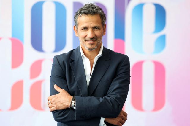 French-Algerian actor Kamel Belghazi poses during a photocall for the TV series "Une famille formidable" as part of the 65th Monte-Carlo Television Festival in the principality of Monaco on June 14, 2026. (Photo by Valery HACHE / AFP)