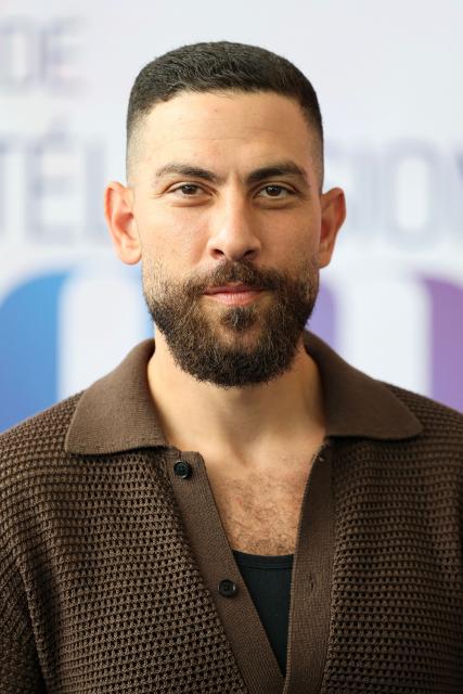 US-Egyptian actor Zeeko Zaki poses during a photocall for the TV series "Wolf" as part of the 65th Monte-Carlo Television Festival in the principality of Monaco on June 14, 2026. (Photo by Valery HACHE / AFP)