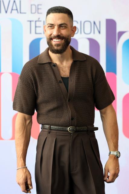 US-Egyptian actor Zeeko Zaki poses during a photocall for the TV series "Wolf" as part of the 65th Monte-Carlo Television Festival in the principality of Monaco on June 14, 2026. (Photo by Valery HACHE / AFP)
