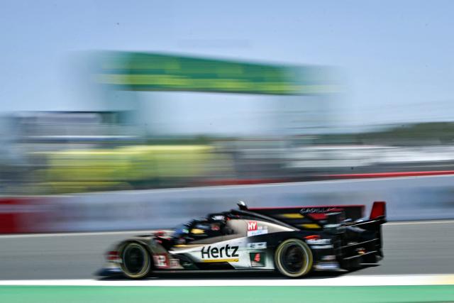 The Cadillac Hertz Team Jota's car of Swiss driver Louis Deletraz, British driver Will Stevens and French driver Norman Nato takes car during the 94th edition of the 24 Hours of Le Mans at the Le Mans circuit, north-western France, on June 14, 2026. (Photo by Lou BENOIST / AFP)