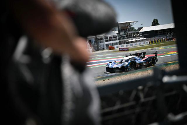 The Alpine Endurance Racing's car of Portuguese driver António Félix da Costa, French driver Charles Milesi and Ferdinand Habsburg takes a corner during the 94th edition of the 24 Hours of Le Mans at the Le Mans circuit, north-western France, on June 14, 2026. (Photo by Lou BENOIST / AFP)