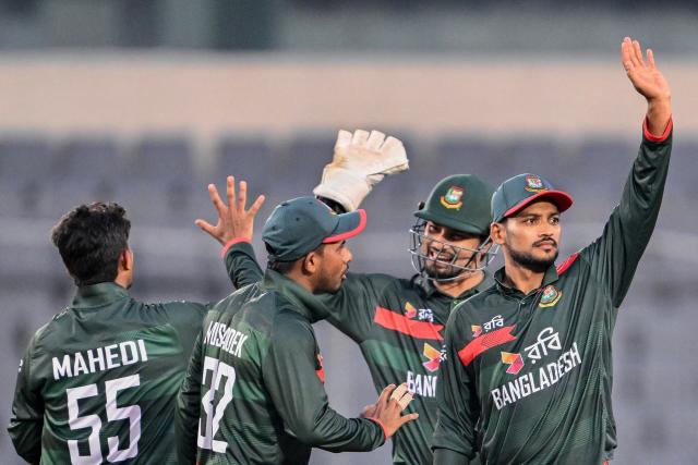 Bangladesh's players celebrate after the dismissal of Australia's Cameron Green during the third one-day international (ODI) cricket match between Bangladesh and Australia at the Sher-e-Bangla National Stadium in Dhaka on June 14, 2026. (Photo by Munir UZ ZAMAN / AFP)
