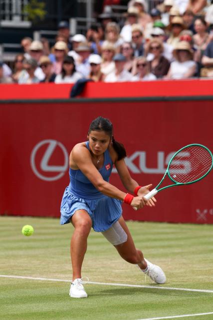 Britain's Emma Raducanu returns against Croatia's Donna Vekic during their women's singles final tennis match at the HSBC WTA Championships at Queen's Club in west London on June 14, 2026. (Photo by Adrian Dennis / AFP)
