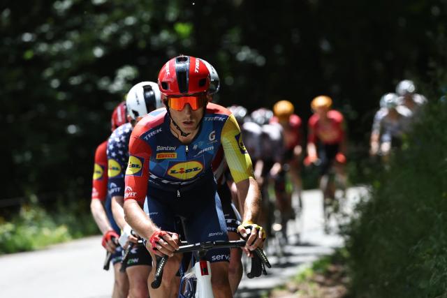 Lidl-Trek's Spanish rider Carlos Verona leads the pack of riders (peloton) cycles during the 8th and final stage of the Tour Auvergne-Rhone-Alpes cycling race (formerly known as the Criterium du Dauphine), 120,1km between Beaufort and Plateau de Solaison, in the French Alps on June 14, 2026. (Photo by Anne-Christine POUJOULAT / AFP)