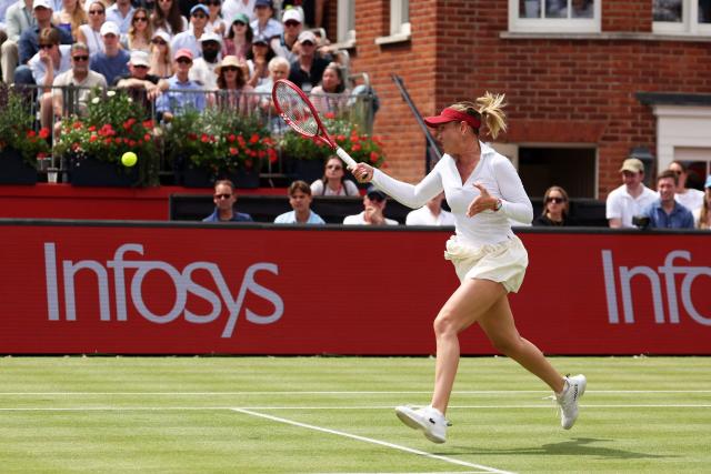 Croatia's Donna Vekic returns to Britain's Emma Raducanu during their women's singles final tennis match at the HSBC WTA Championships at Queen's Club in west London on June 14, 2026. (Photo by Adrian Dennis / AFP)