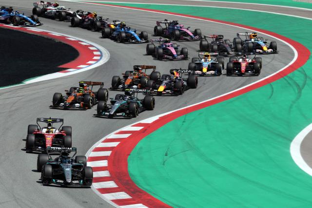 Mercedes' British driver George Russell leads at the start of the Catalonia Formula One Grand Prix at the Circuit de Catalunya in Montmelo, on the outskirts of Barcelona, on June 14, 2026. (Photo by Lluis GENE / AFP)